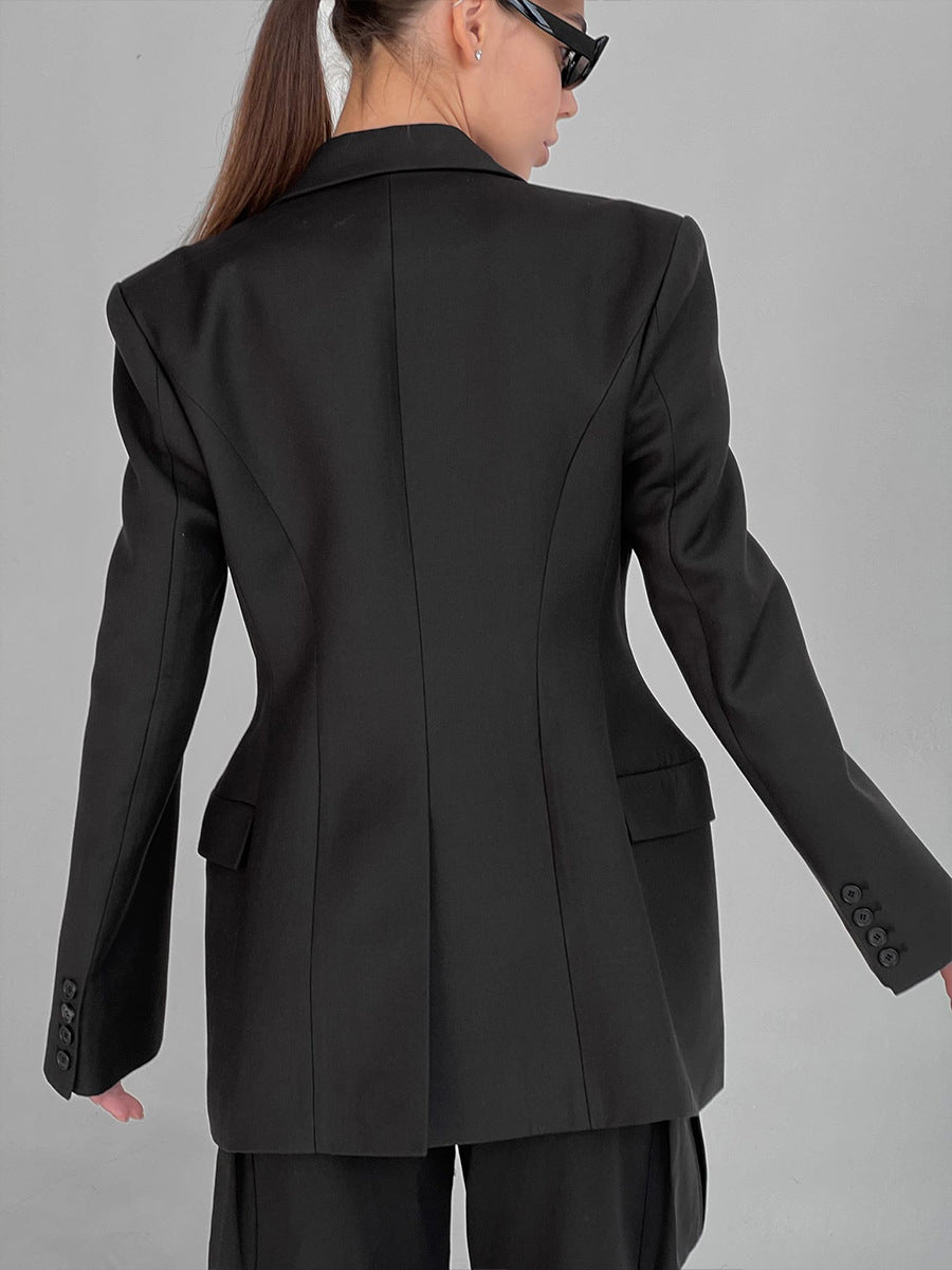 Tailored Two-Button Blazer with Cinched Waist in Black — back view on model