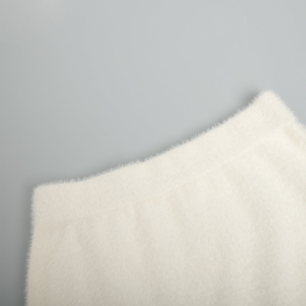 Soft Fuzzy V-Neck Sweater & Knit Maxi Skirt Set in Ivory — close-up of the skirt waistband