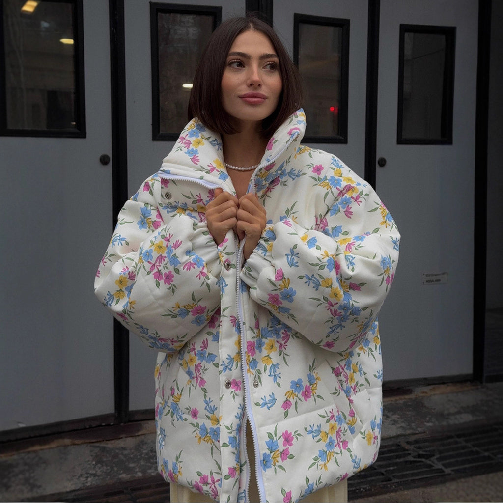 Floral Print Puffer Jacket with Stand Collar in Cream Floral — front view on model, zipped up