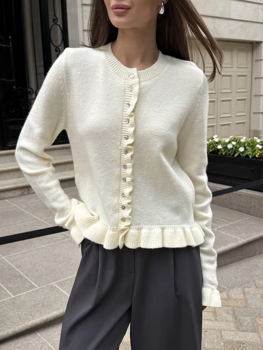 Ruffle-Trim Button-Front Knit Cardigan in Ivory — front view on model