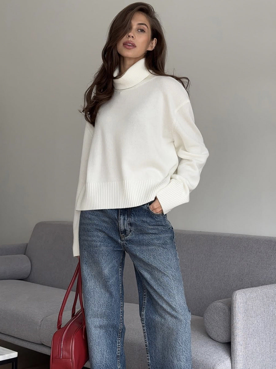 Relaxed High Neck Sweater with Ribbed Cuffs in Ivory — front view on model or garment