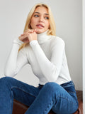 Fitted Ribbed Turtleneck Sweater in White — front view