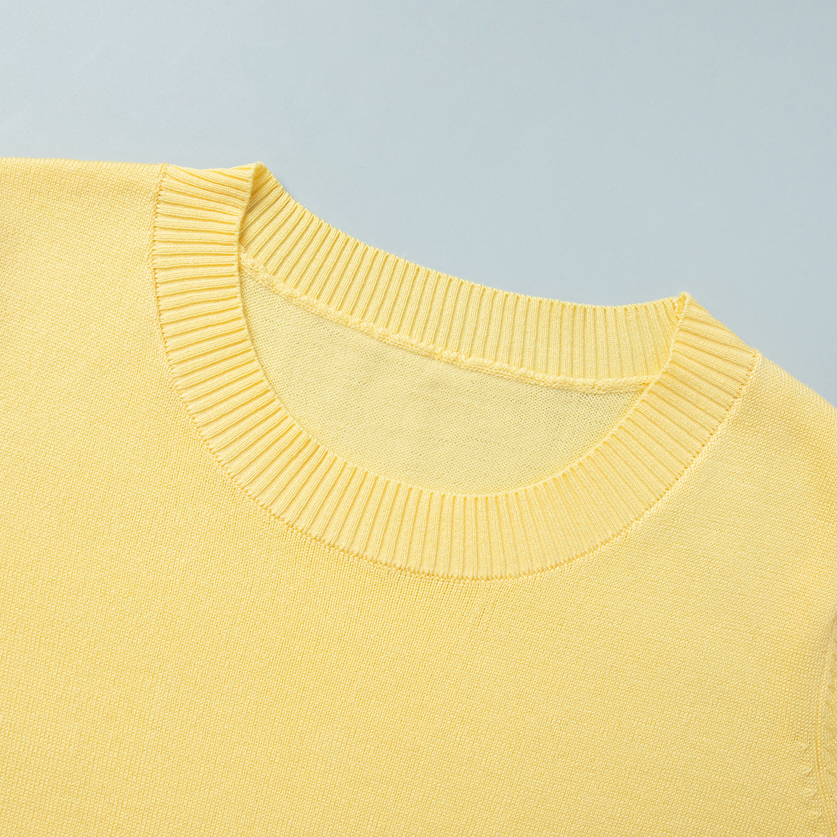 Short Sleeve Knit Top & Maxi Skirt Set in Butter Yellow — close-up of the ribbed crew neck