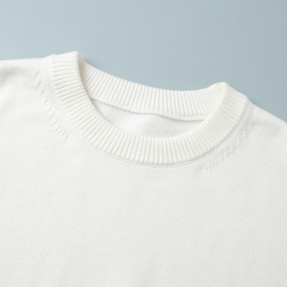 Slouchy Oversized Crew Neck Sweater in Ivory — close-up of the ribbed crew neck