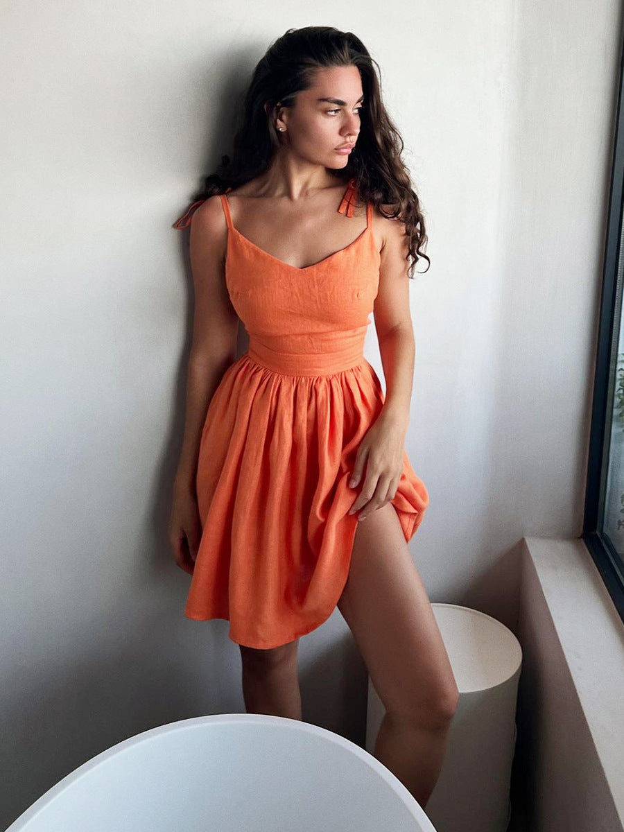 Tie-Shoulder Open-Back Cotton Mini Dress in Bright Orange — on model