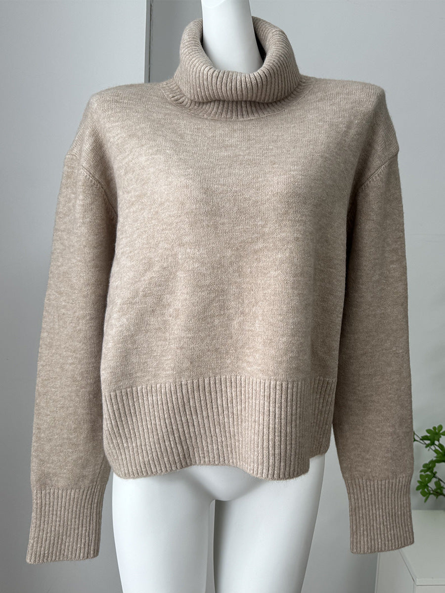 Relaxed High Neck Sweater with Ribbed Cuffs in Oatmeal — front view on model or garment