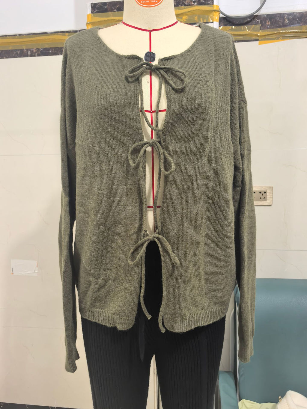 Round Neck Tie-Front Knit Cardigan in Olive — front view on mannequin