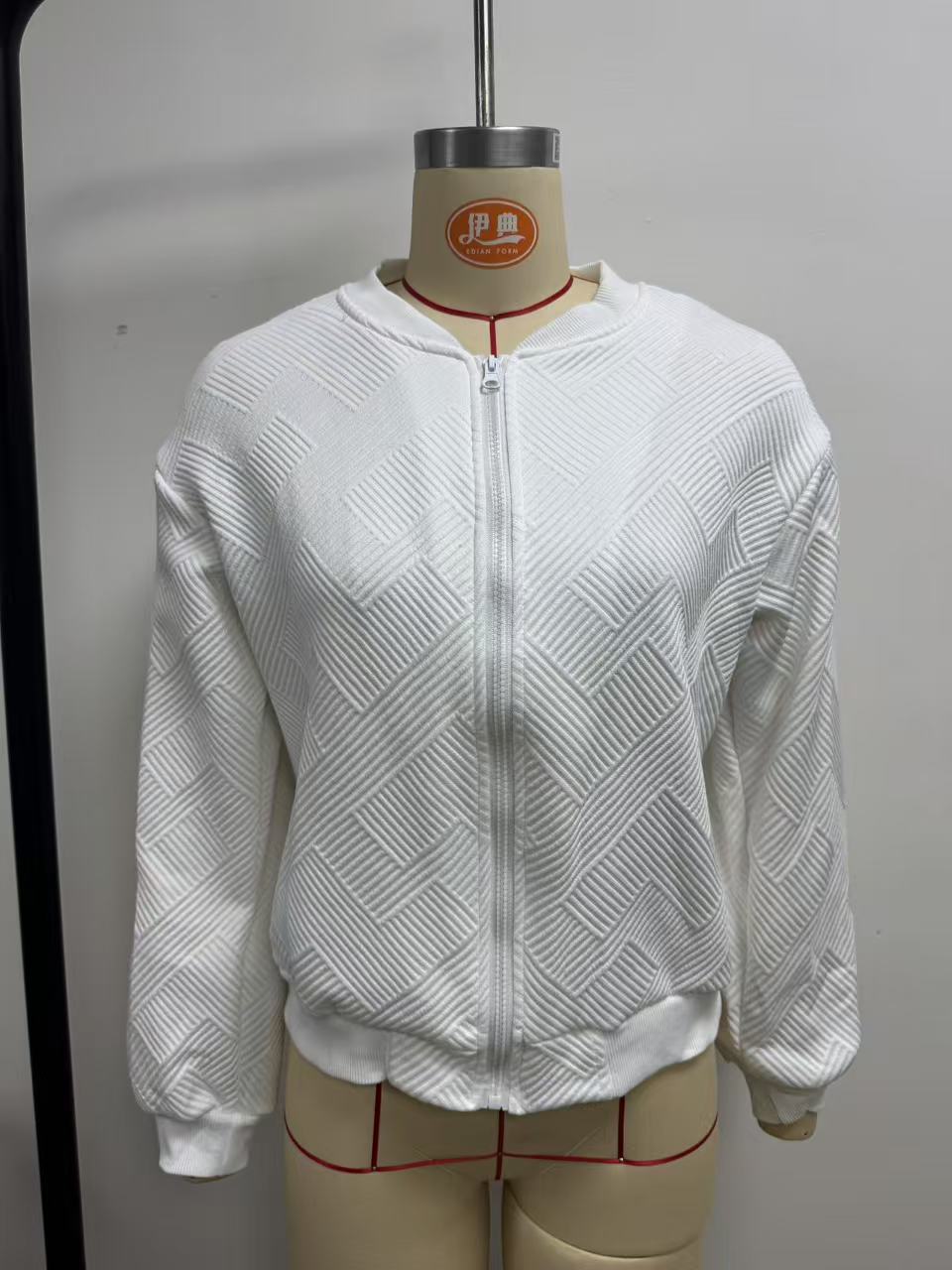 Textured Knit Zip-Up Jacket in White — front view on a dress form
