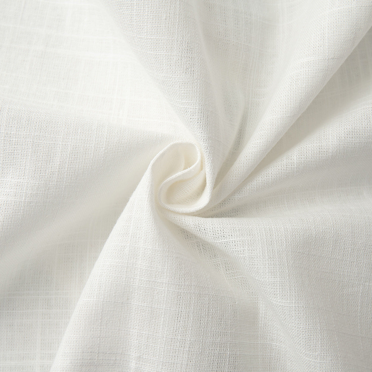 Cotton Tie-Front Top & Ruffle Shorts Set in White — close-up of the cotton texture