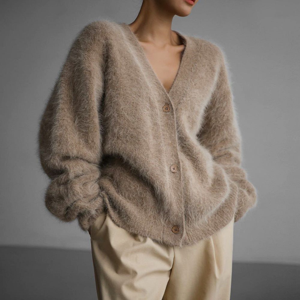 Fuzzy Knit Oversized V-Neck Cardigan in Mocha — front view on model with beige trousers