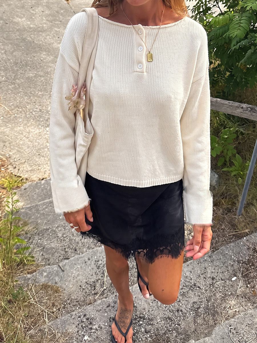 Relaxed Henley Sweater with Button Placket in Ivory — front view on model