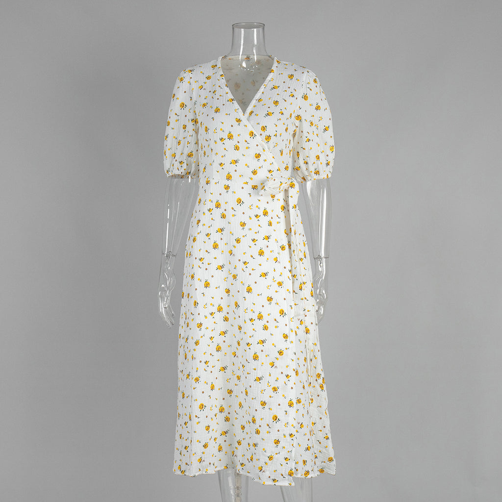 Cotton Floral Puff-Sleeve Wrap Midi Dress in Yellow Floral — front on mannequin