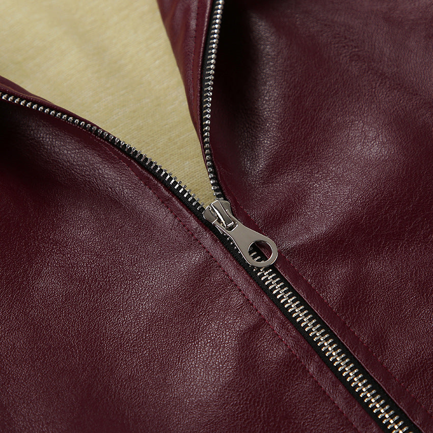 Faux Leather Bomber Jacket with Point Collar in Burgundy — close-up of the front zip