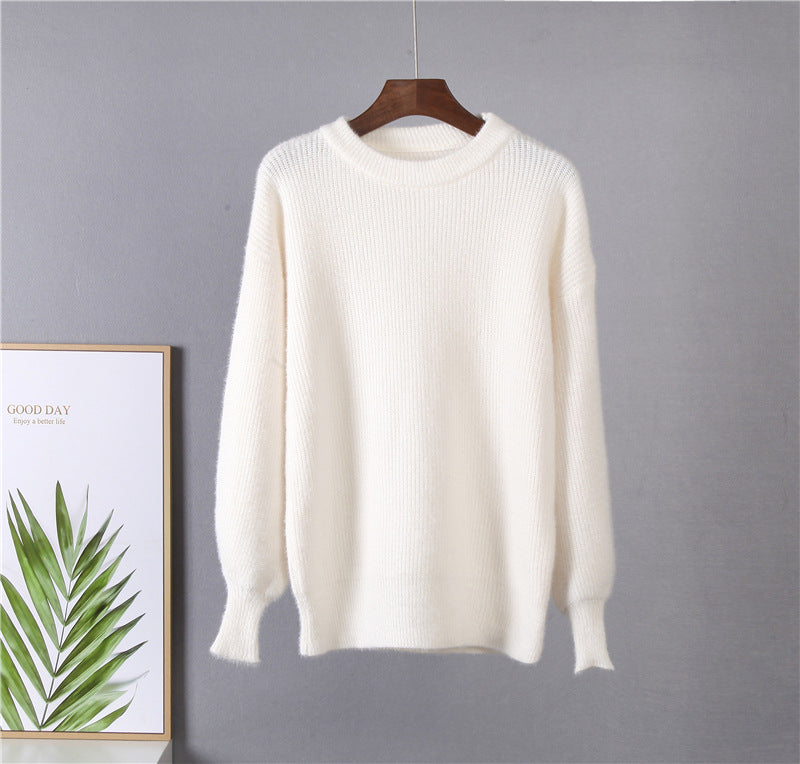 Relaxed Balloon Sleeve Ribbed Sweater in Ivory — front view on hanger