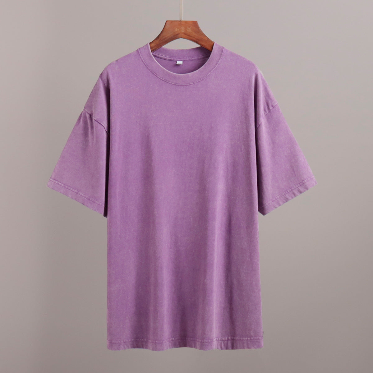 Oversized Washed Cotton Crewneck Tee in Washed Purple — on hanger