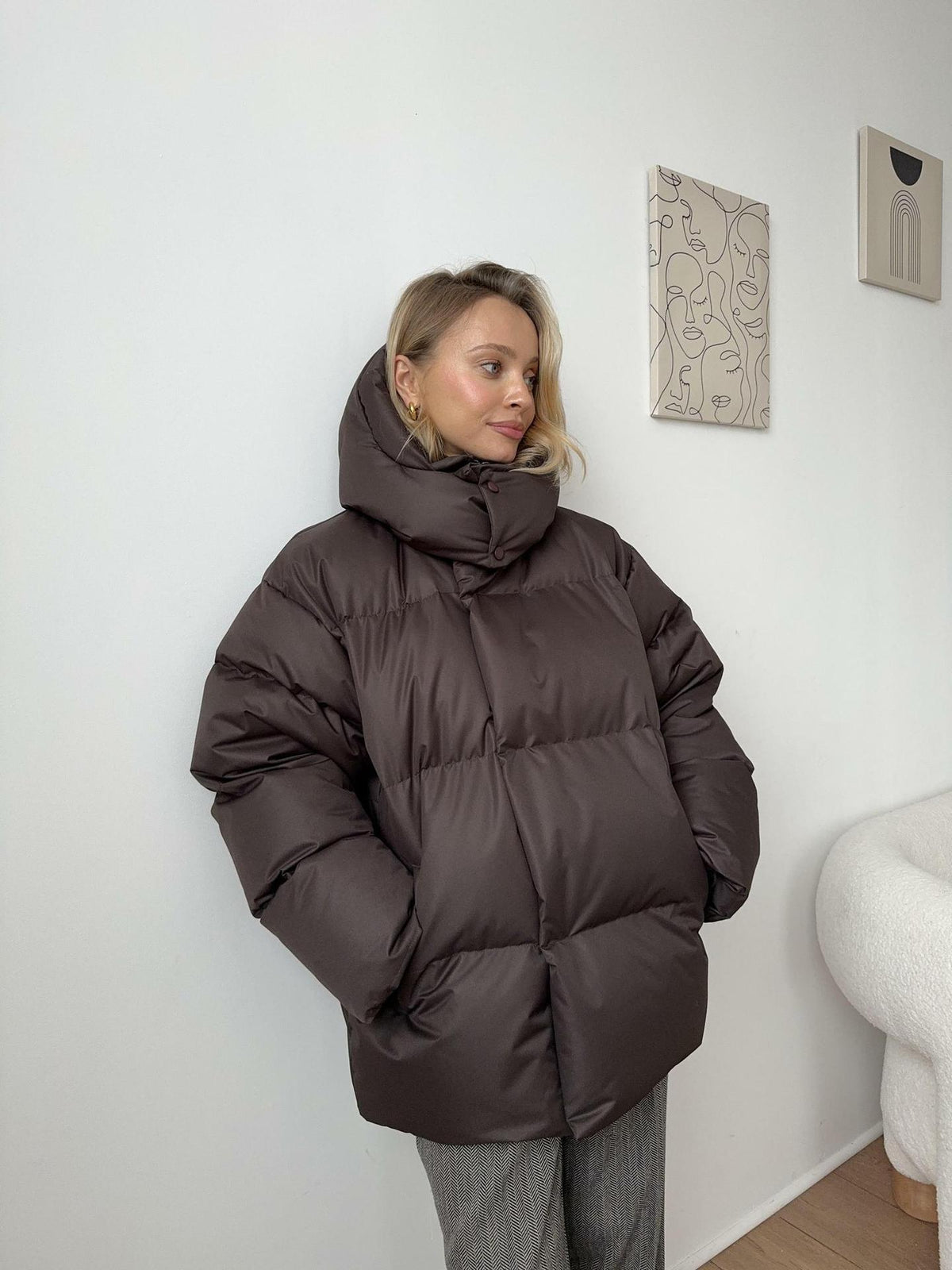 Matte Oversized Hooded Puffer Jacket in Dark Brown — front view on model