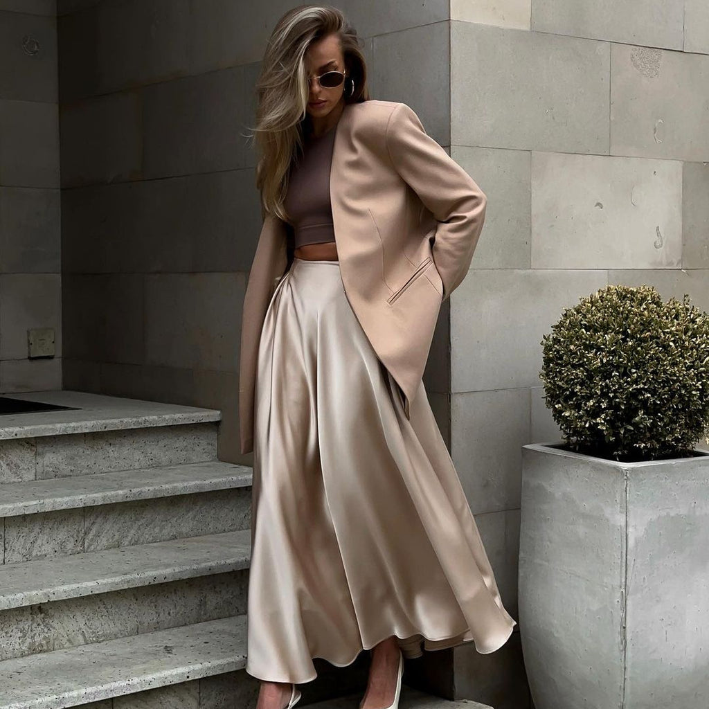 Satin A-Line Midi Skirt with Elastic Waist in Champagne — on model with a camel blazer