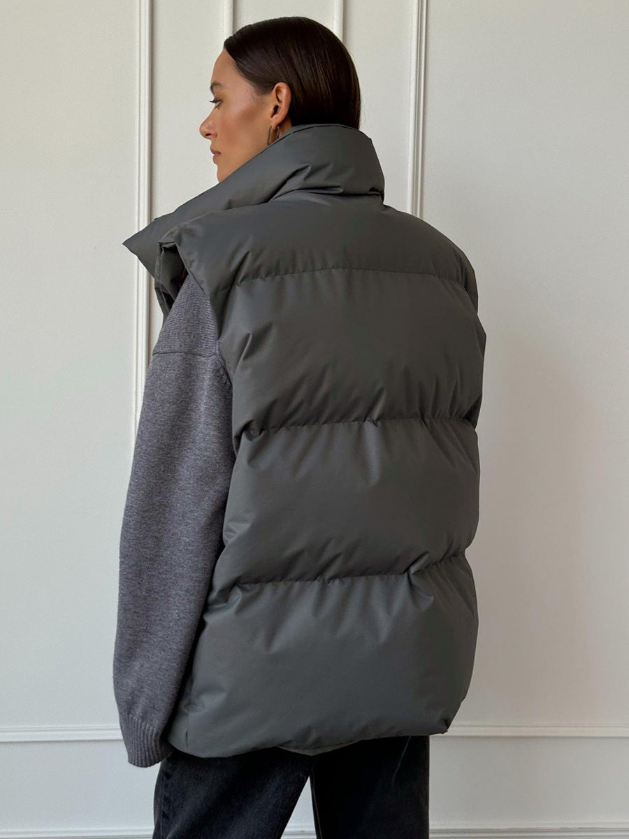 Longline Puffer Vest with High Stand Collar in Charcoal Gray — back view on model