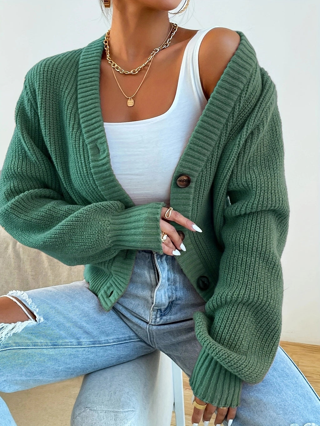 Chunky Ribbed V-Neck Button Cardigan in Sage Green — on model