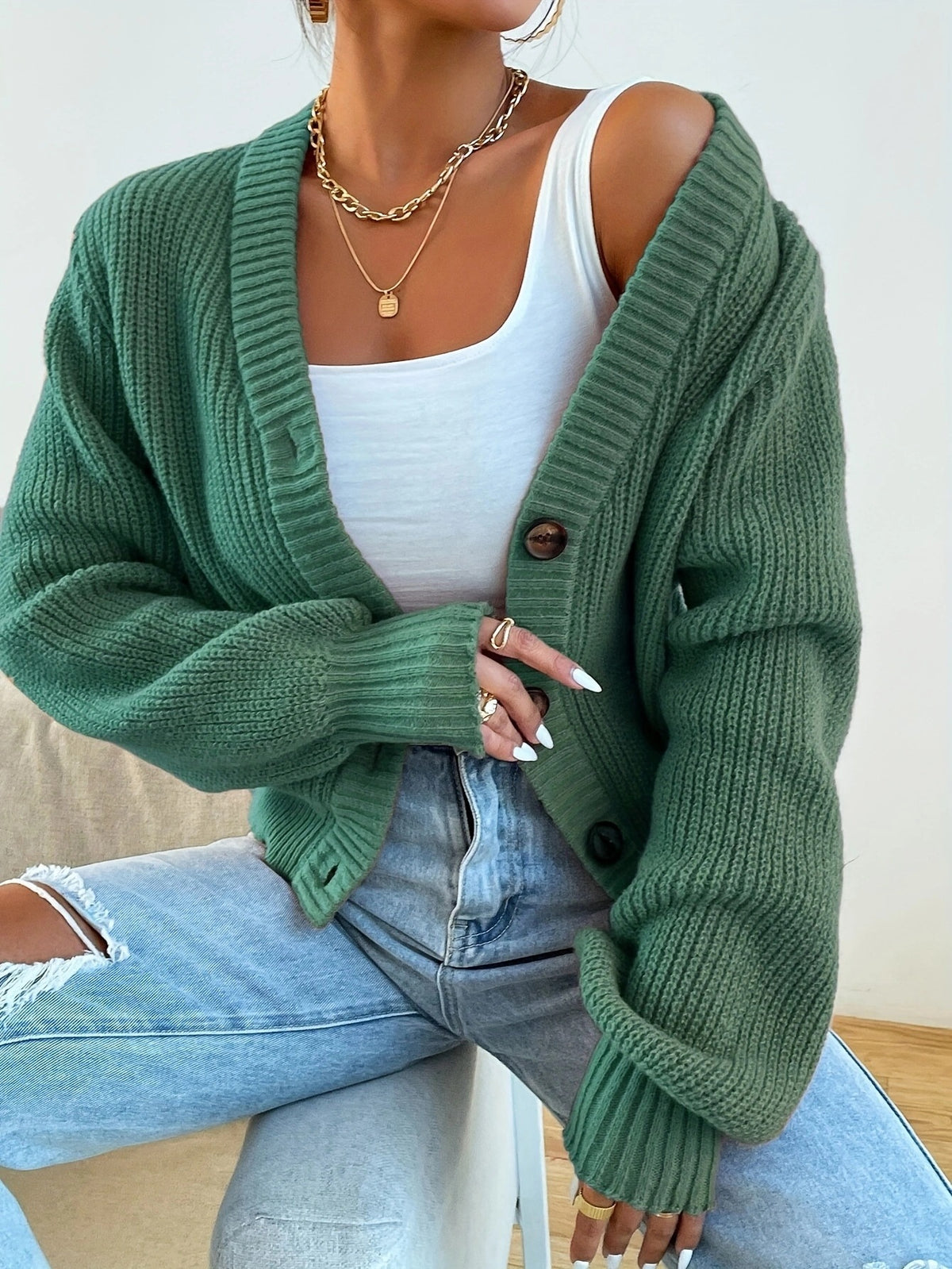 Chunky Ribbed V-Neck Button Cardigan in Sage Green — on model