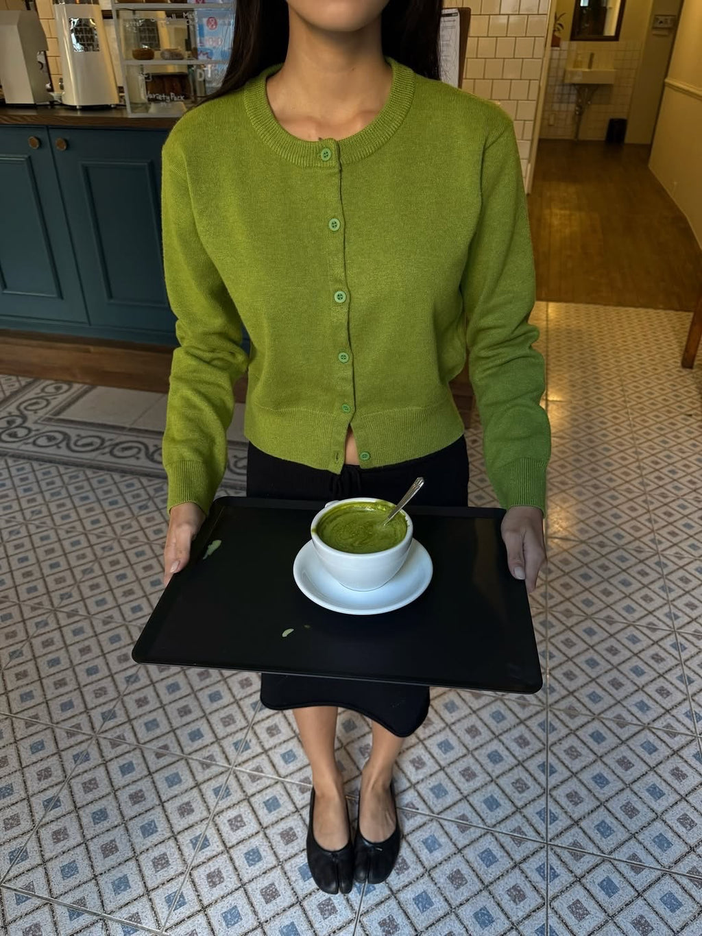 Cropped Crew-Neck Button Cardigan in Lime Green — on model with a black skirt