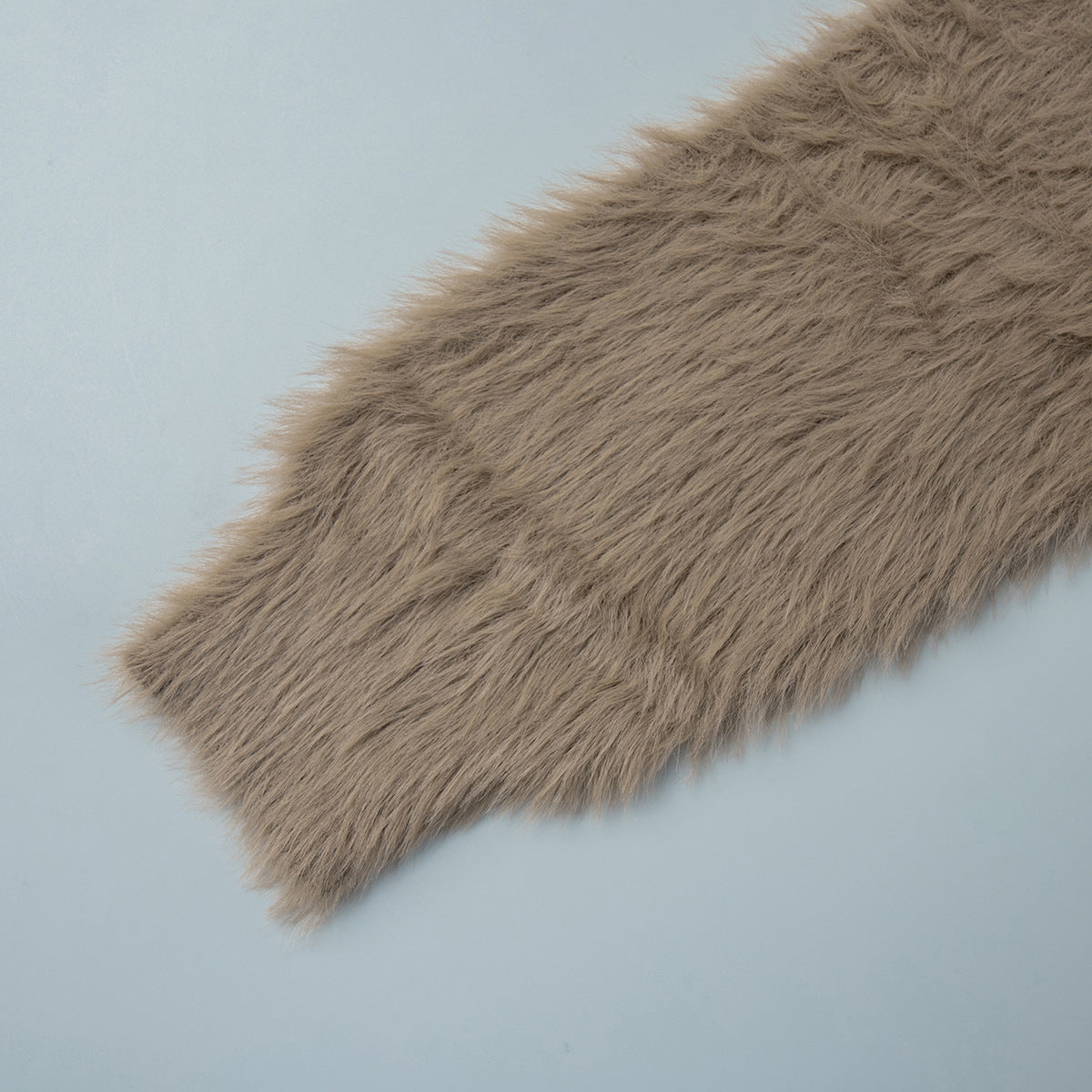 Fuzzy Knit Oversized V-Neck Cardigan in Mocha — close-up of sleeve and ribbed cuff