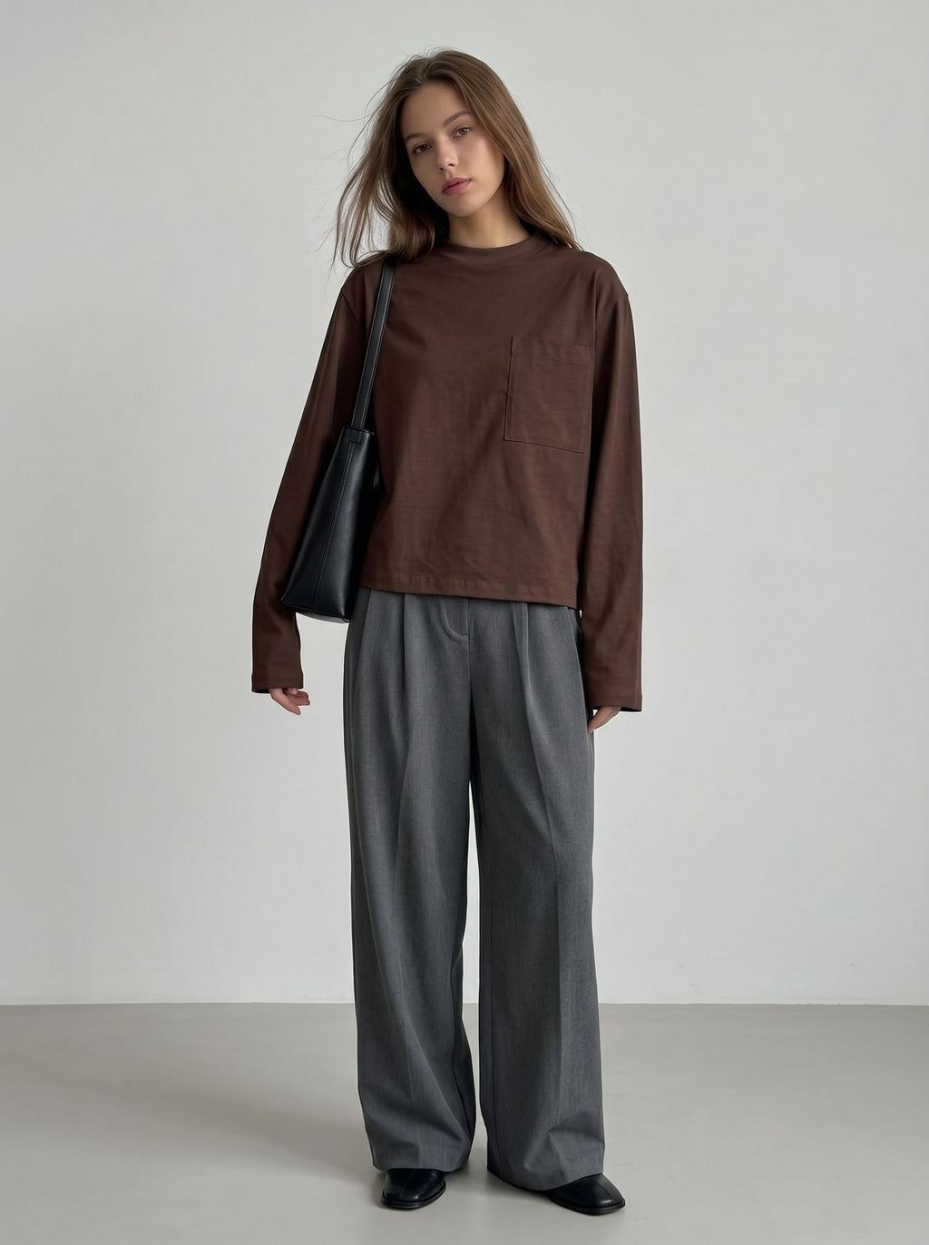 Relaxed Cotton Long-Sleeve Pocket Tee in Chocolate — full-length view on model