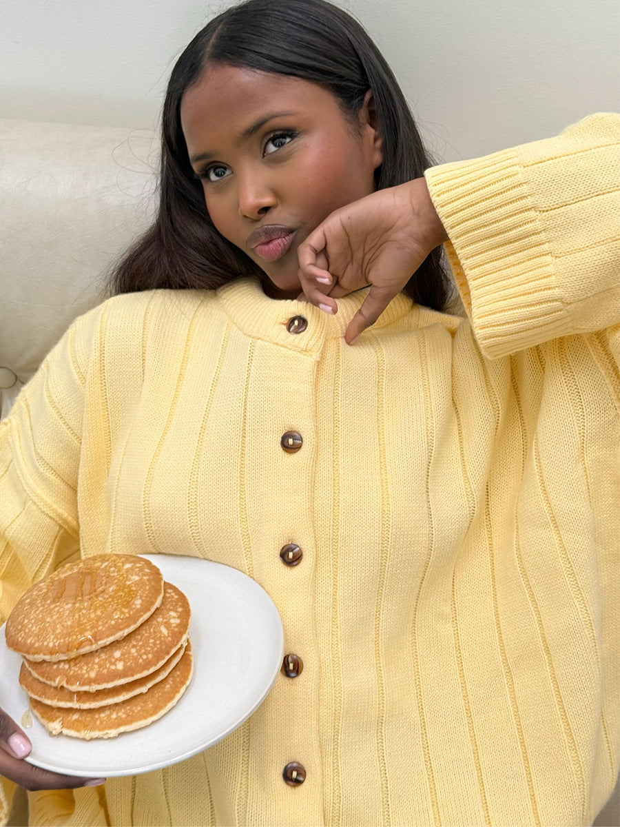 Oversized Wide-Rib Crew Neck Button Cardigan in Butter Yellow — close view on model