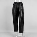 Faux Leather Balloon Pants with Drawstring Ankles in Black — front view
