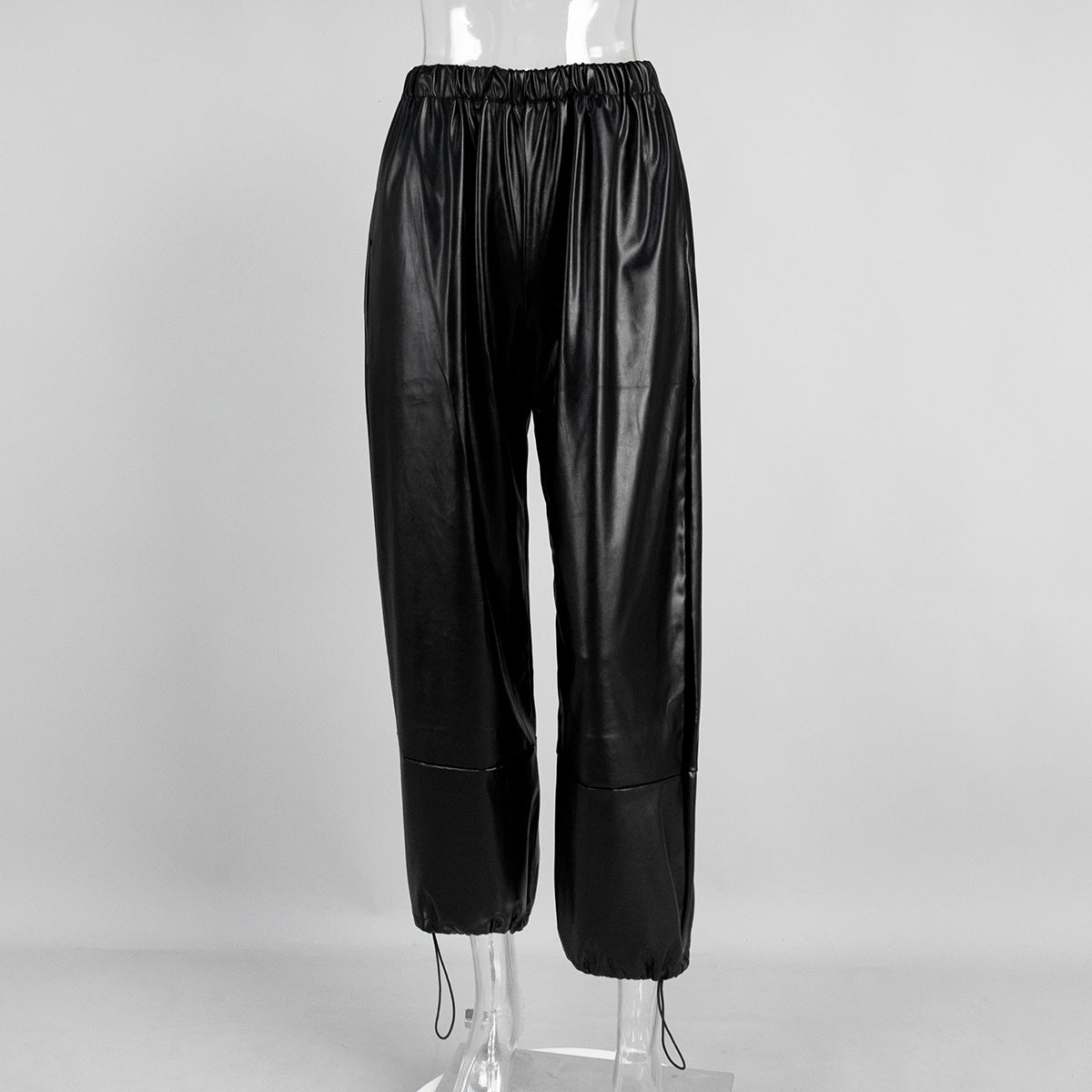 Faux Leather Balloon Pants with Drawstring Ankles in Black — front view