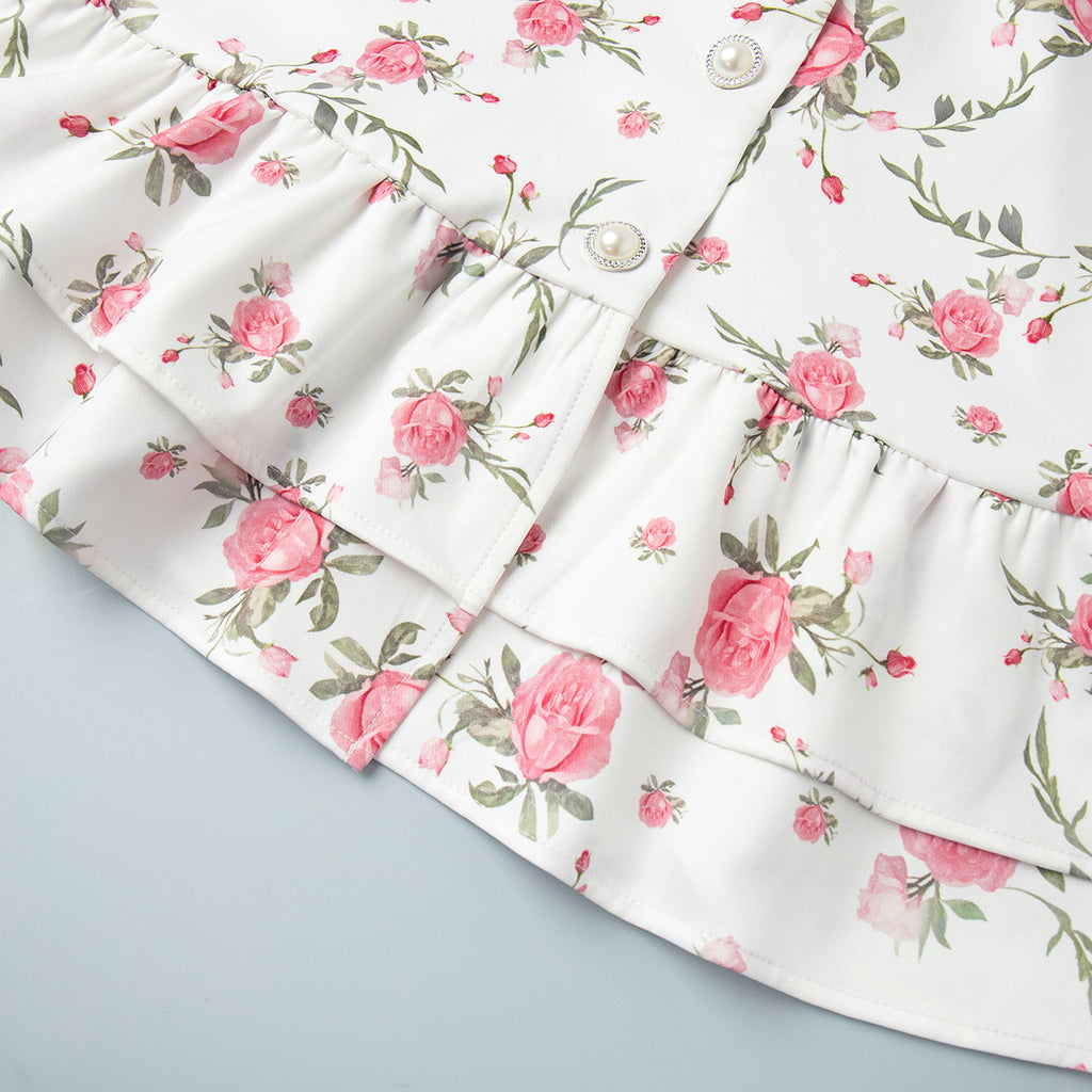 Floral Puff-Sleeve Mini Dress with Contrast Collar in Cream Floral — close-up of the ruffled hem