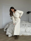 V-Neck Button Cardigan & Knit Midi Skirt Set in Ivory — full-length front view on model