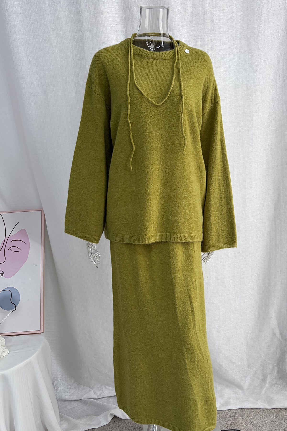 Relaxed Knit Sweater & Maxi Skirt Set with Tie Belt in Matcha — set on a form