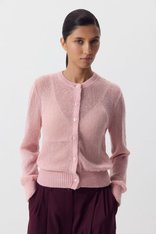 Airy Button-Front Knit Cardigan in Blush Pink — front view on model