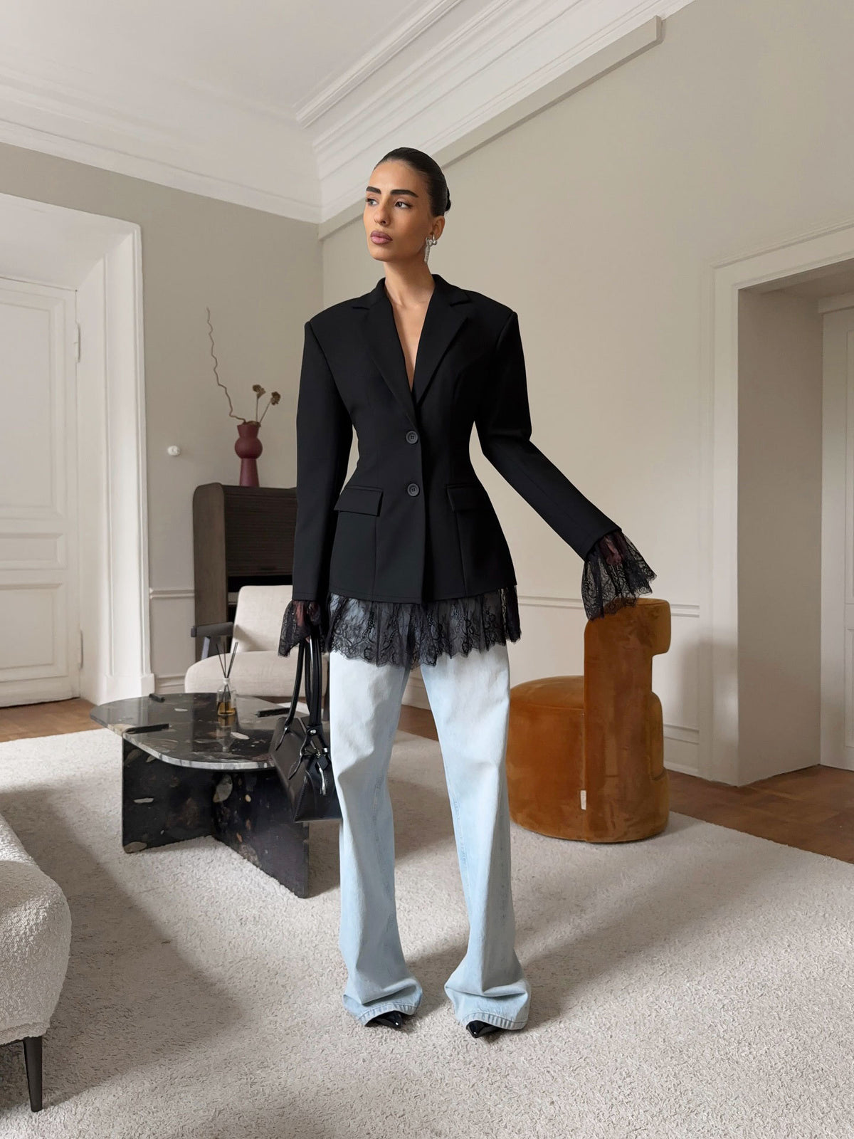 Fitted Blazer with Lace-Trimmed Hem and Cuffs in Black — full-length view on model with wide-leg jeans