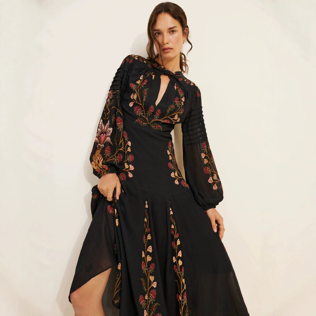 Floral Print Keyhole Midi Dress with Balloon Sleeves in Black — front view on model