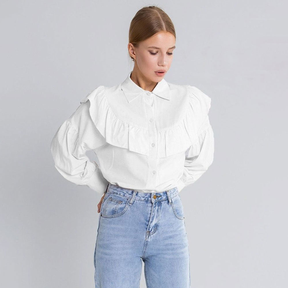 Cotton Ruffle Collar Button-Down Blouse in White — front view on model, tucked into jeans
