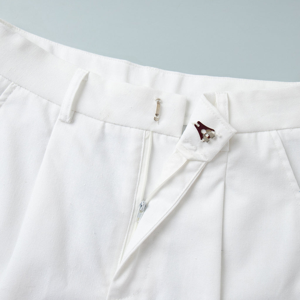 Linen-Blend Vest & Pleated Shorts Set in White — close-up of the side pocket