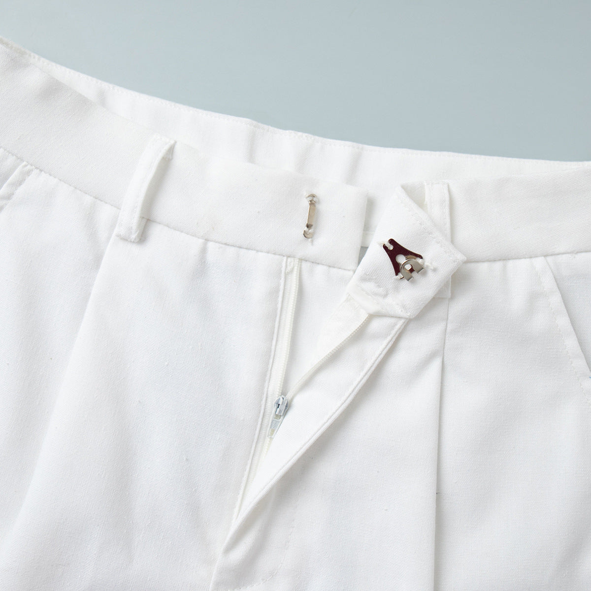 Linen-Blend Vest & Pleated Shorts Set in White — close-up of the side pocket