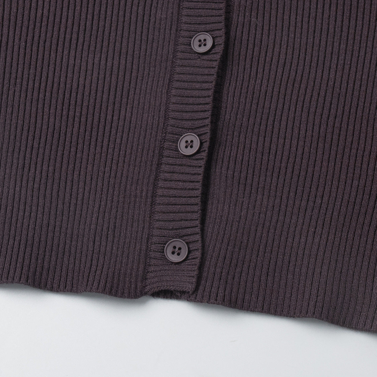 Ribbed Knit Cardigan & Low-Rise Wide-Leg Pants Set in Espresso — close-up of button front and ribbed hem
