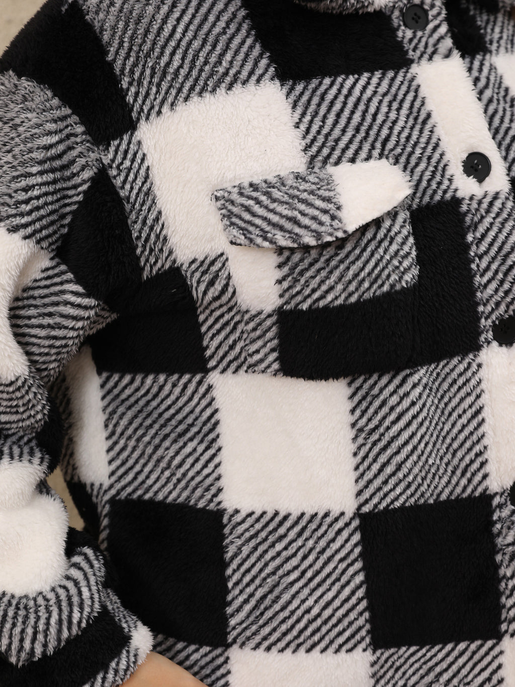 Plus-Size Buffalo Check Plush Shirt Jacket in Black & White Check — close-up of the flap chest pocket