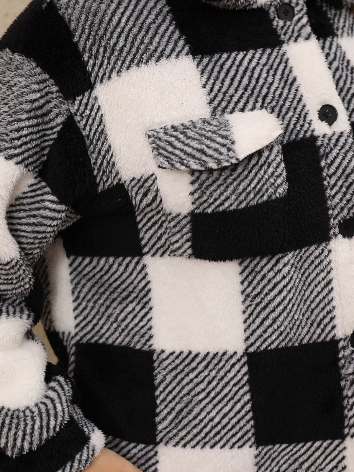 Plus-Size Buffalo Check Plush Shirt Jacket in Black & White Check — close-up of the flap chest pocket