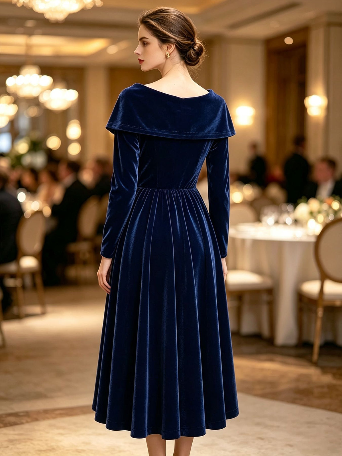 Velvet Midi Dress with Portrait Collar and Rhinestone Brooch in Navy — back view on model