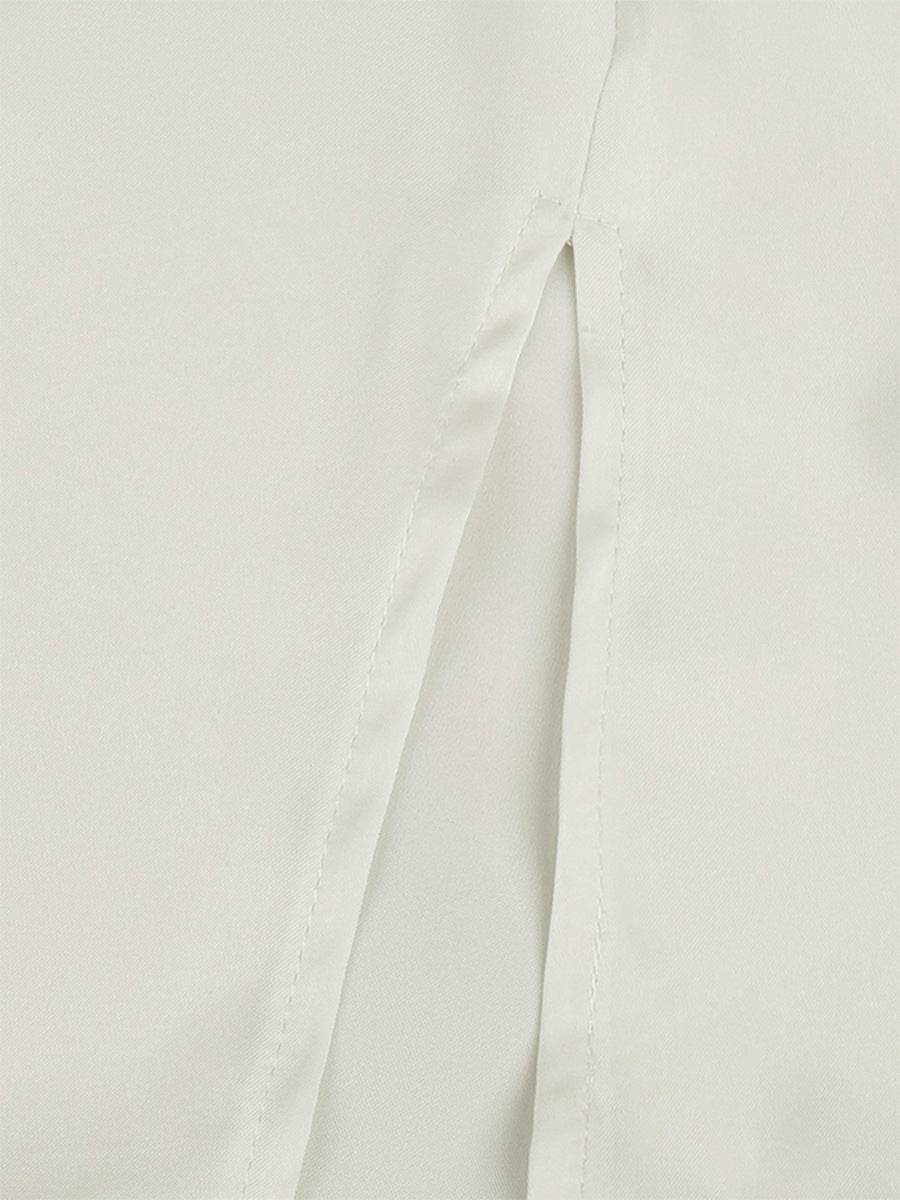 Satin Lace-Trim Mini Slip Dress with Tie Back in Ivory — close-up of the side slit