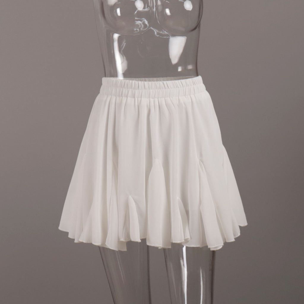 Pleated Bubble Mini Skirt in White — front view on mannequin