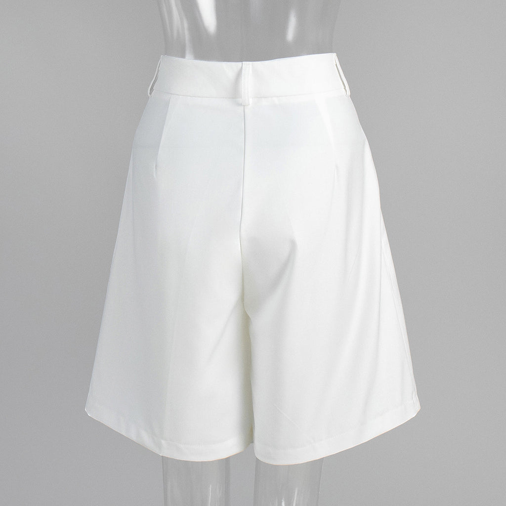 High-Waist Pleated Bermuda Shorts in White — side view on mannequin
