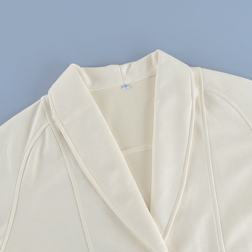 Belted Faux Suede Jacket with Shawl Collar in Ivory — close-up of the shawl collar