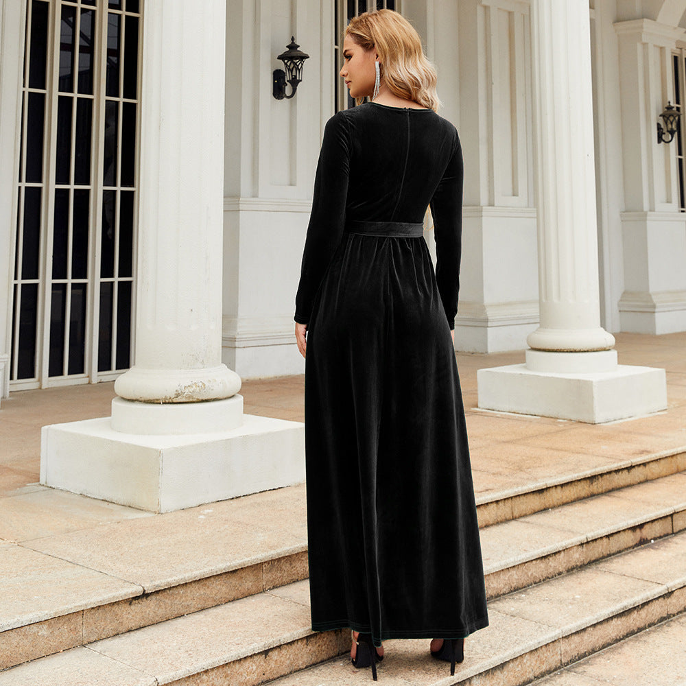 Long-Sleeve Velvet Maxi Dress with Tie Waist in Black — back view on model