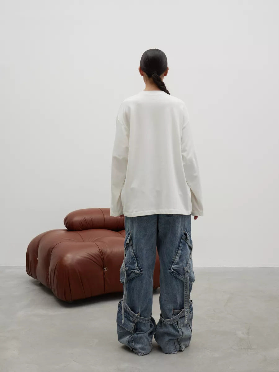 Oversized Cotton Long Sleeve Crew Neck Tee in White — back view on model