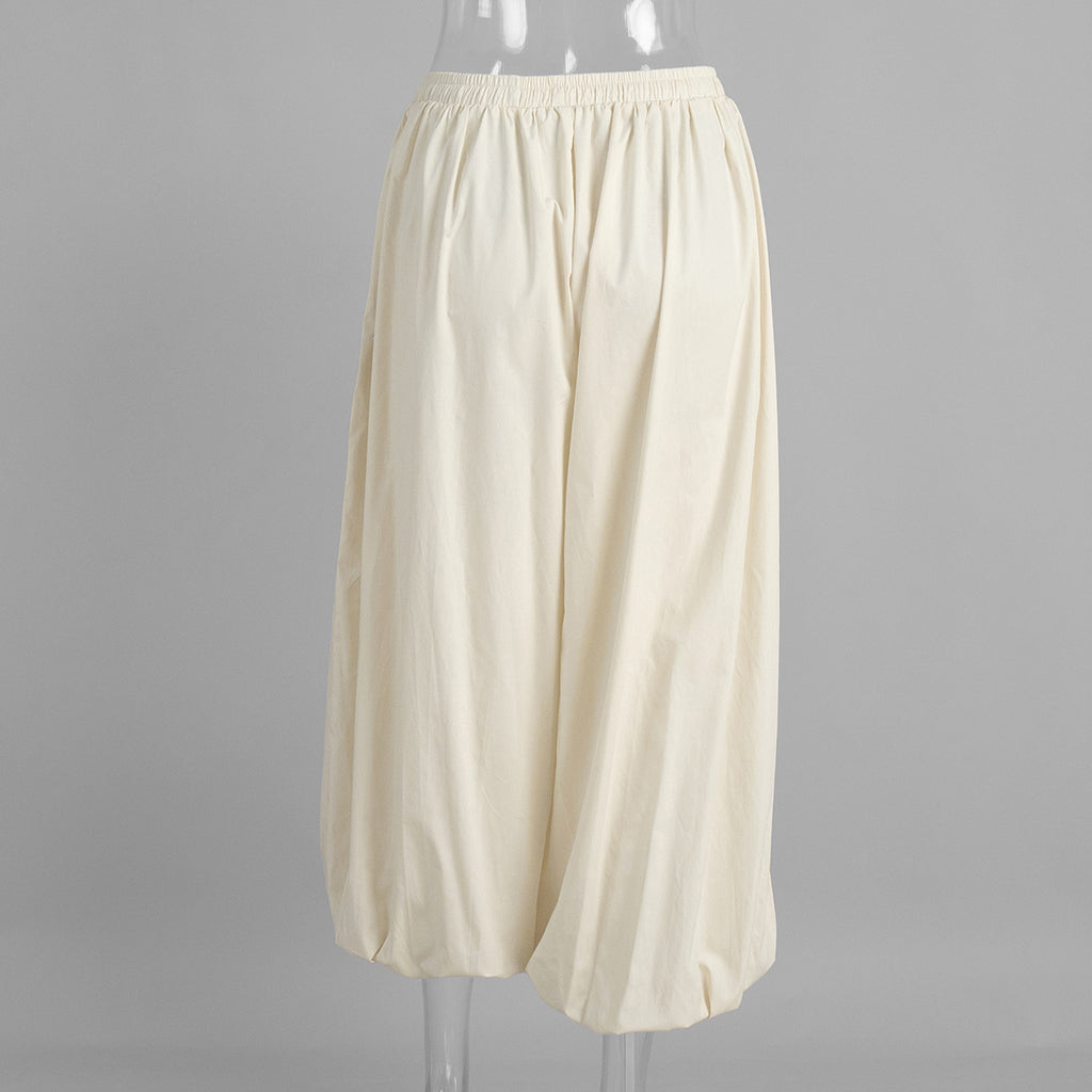 Cotton Balloon Lantern Pants in Apricot Cream — front view on mannequin